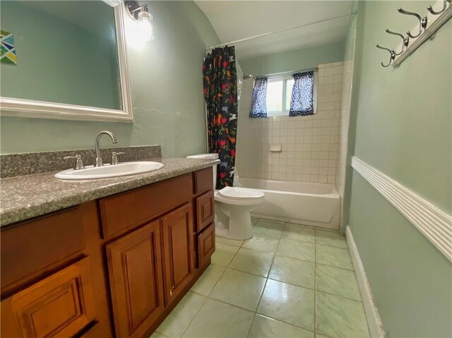 full bathroom with shower / bath combination with curtain, vanity, toilet, and tile patterned flooring