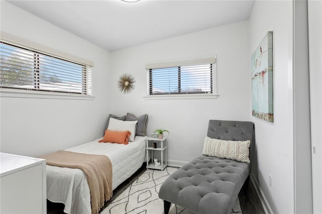 bedroom featuring multiple windows