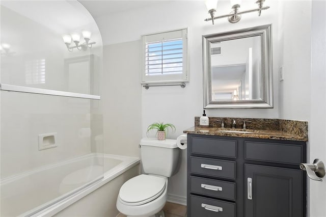 full bathroom featuring vanity, toilet, and bathing tub / shower combination