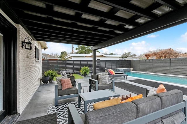 view of patio with a fenced in pool and an outdoor hangout area