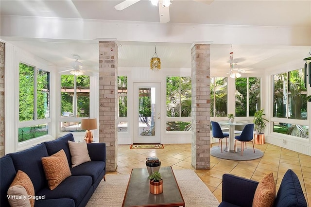 30302 Ashley Dr, Lacombe, LA 70445 - sunroom featuring tile patterned floors, plenty of natural light, and ornate columns