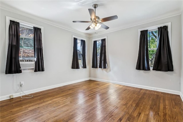 unfurnished room with cooling unit, ceiling fan, ornamental molding, and hardwood / wood-style floors