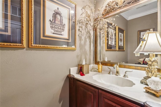 bathroom featuring vanity and crown molding