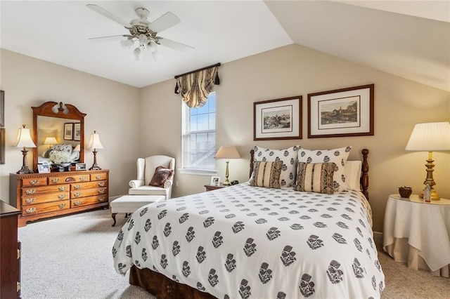 carpeted bedroom with ceiling fan and lofted ceiling