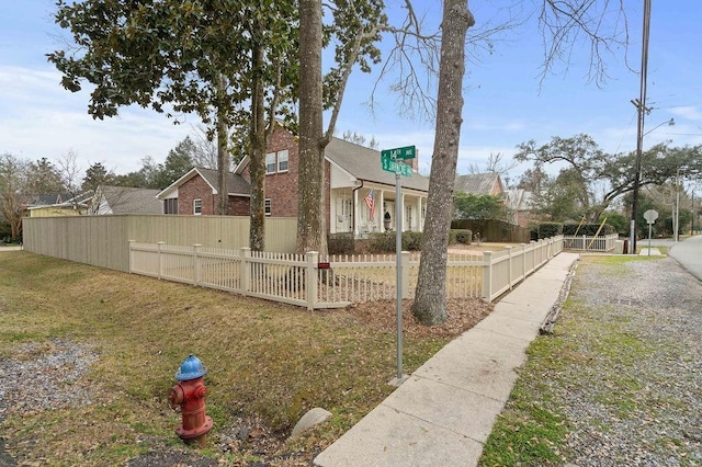 exterior space featuring a front lawn