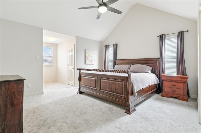 carpeted bedroom featuring lofted ceiling and ceiling fan