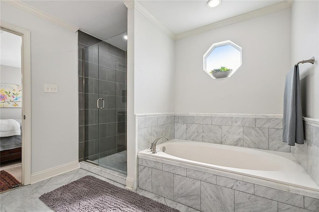 bathroom with ornamental molding and independent shower and bath