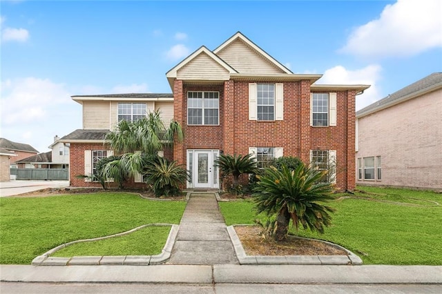 view of front of house featuring a front lawn