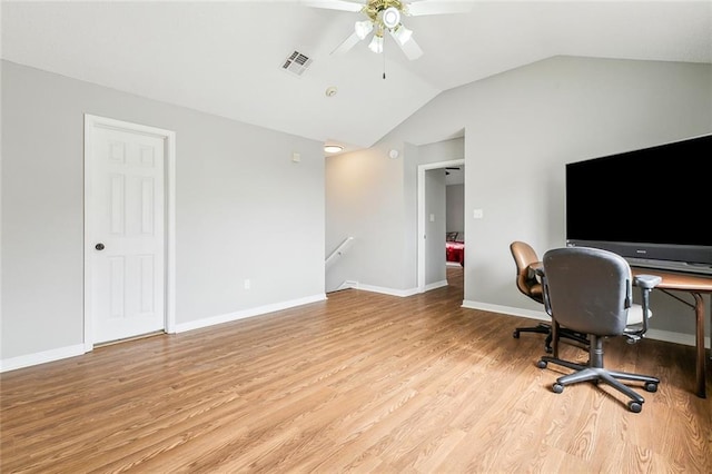 office area featuring ceiling fan, lofted ceiling, and light hardwood / wood-style flooring