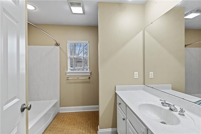 bathroom featuring vanity and shower / bathtub combination