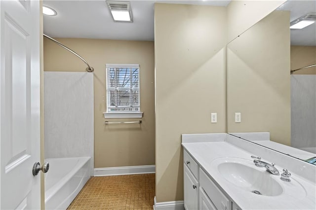 bathroom featuring vanity and shower / bathtub combination