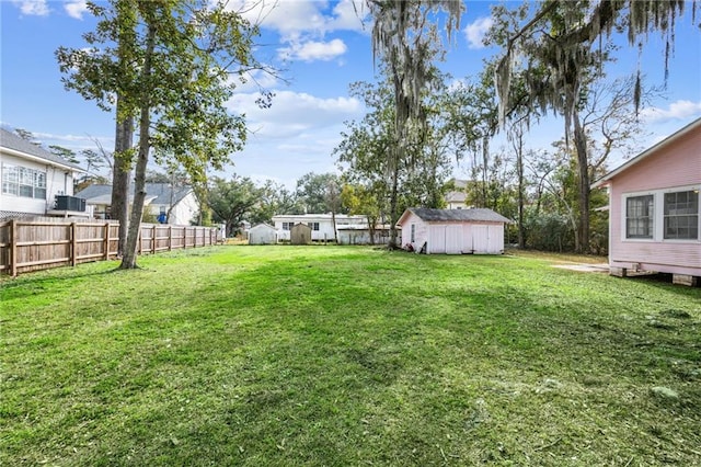 view of yard with a storage shed