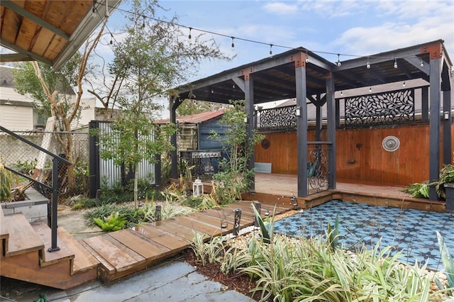 view of patio with a wooden deck