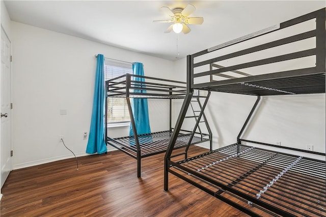 unfurnished bedroom featuring dark hardwood / wood-style flooring