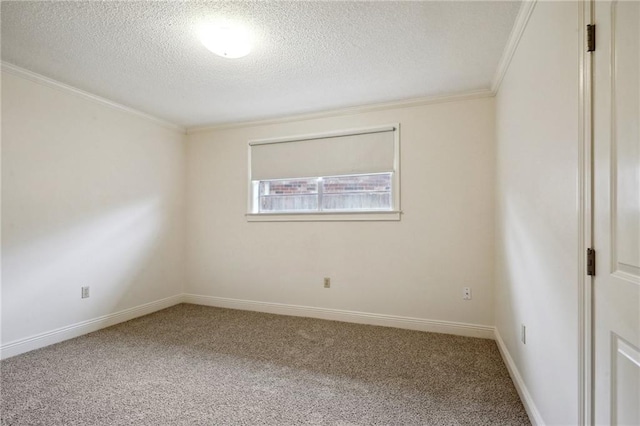 empty room with crown molding, carpet floors, and a textured ceiling