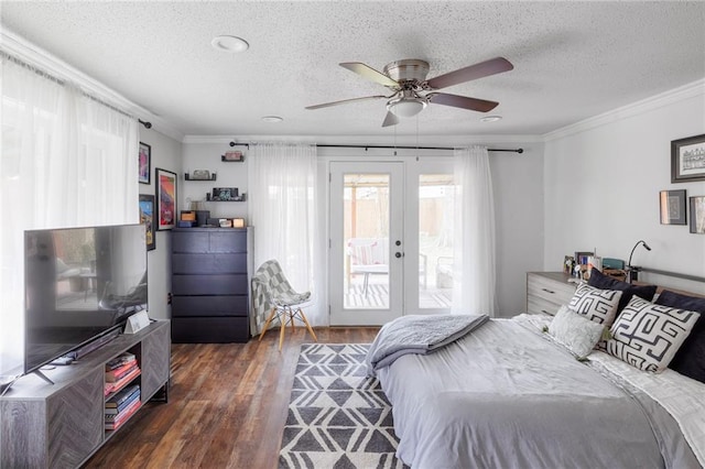 bedroom with ornamental molding, dark hardwood / wood-style floors, access to exterior, and french doors