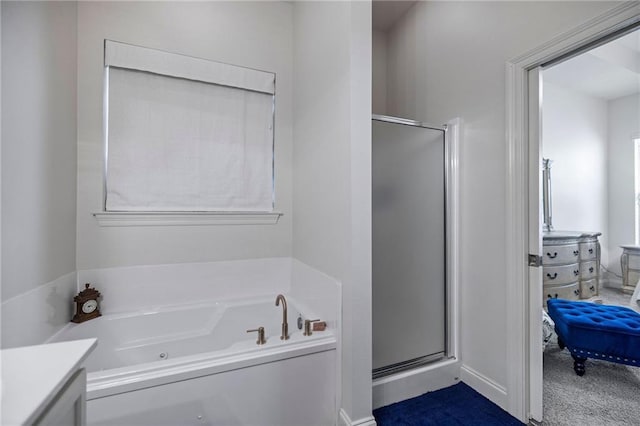 bathroom with vanity and plus walk in shower