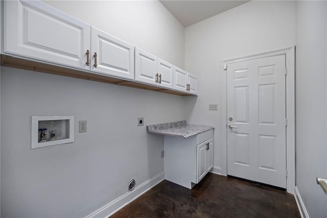 laundry room with washer hookup, cabinets, and hookup for an electric dryer