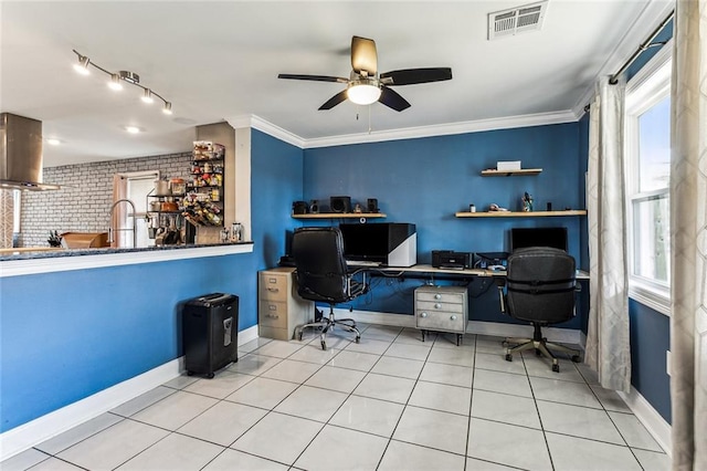 home office featuring crown molding, a healthy amount of sunlight, light tile patterned floors, and ceiling fan