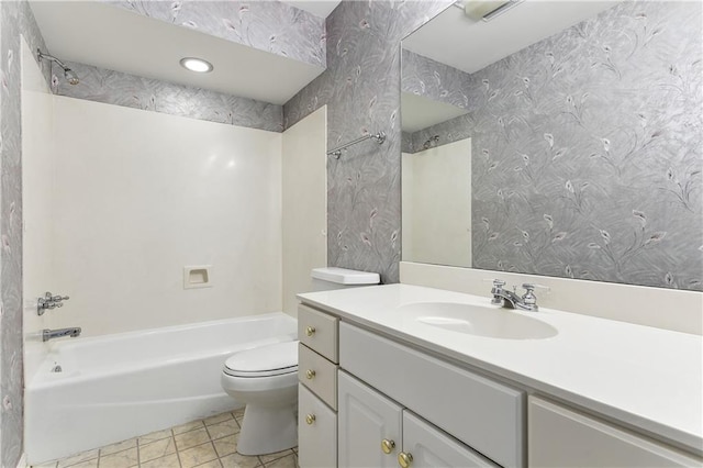 full bathroom featuring shower / bathtub combination, vanity, toilet, and tile patterned floors