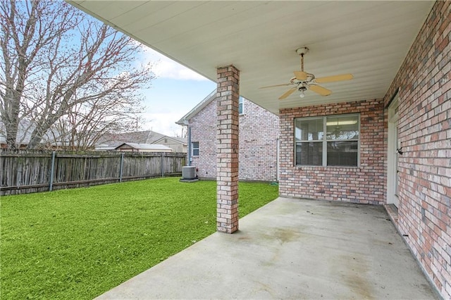 view of patio featuring cooling unit and ceiling fan