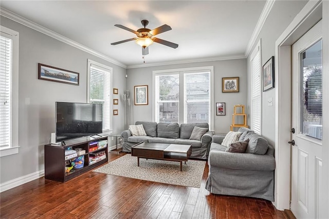 living room featuring ceiling fan, ornamental molding, and dark hardwood / wood-style flooring