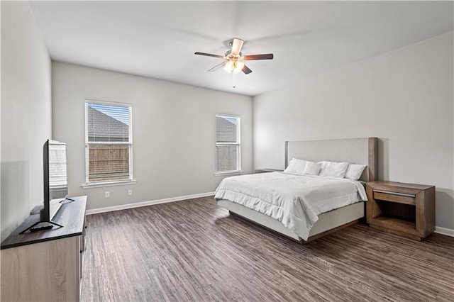 bedroom featuring dark wood-type flooring and ceiling fan