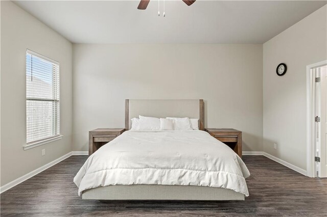 bedroom featuring dark wood-type flooring and ceiling fan