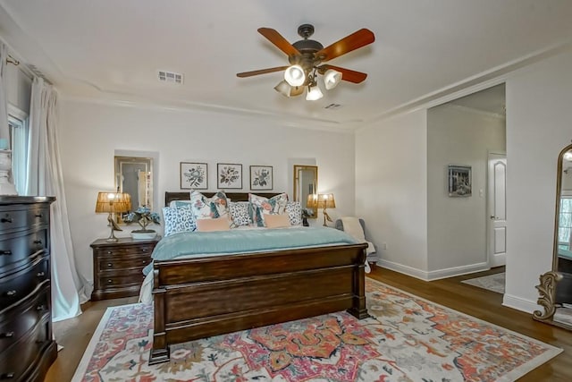 bedroom featuring dark wood-type flooring and ceiling fan