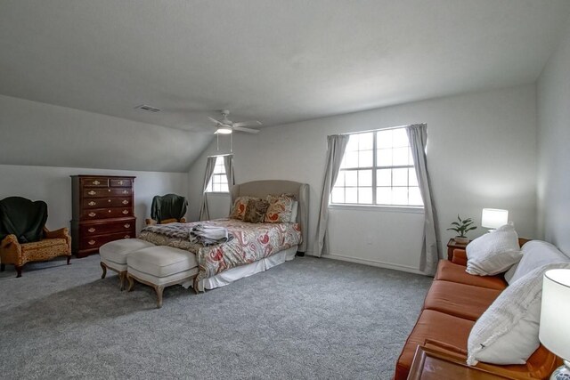 bedroom with lofted ceiling, carpet floors, and ceiling fan