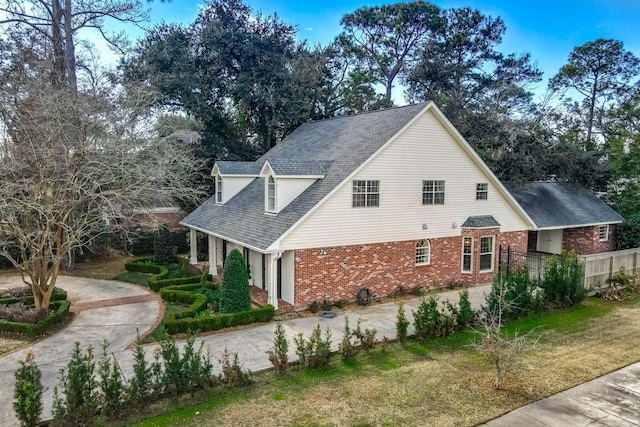 view of home's exterior with a yard