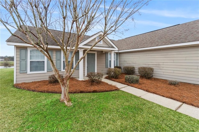 ranch-style home with a front yard