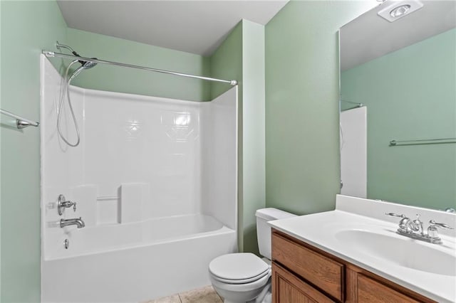 full bathroom with tile patterned flooring, vanity, shower / bathtub combination, and toilet