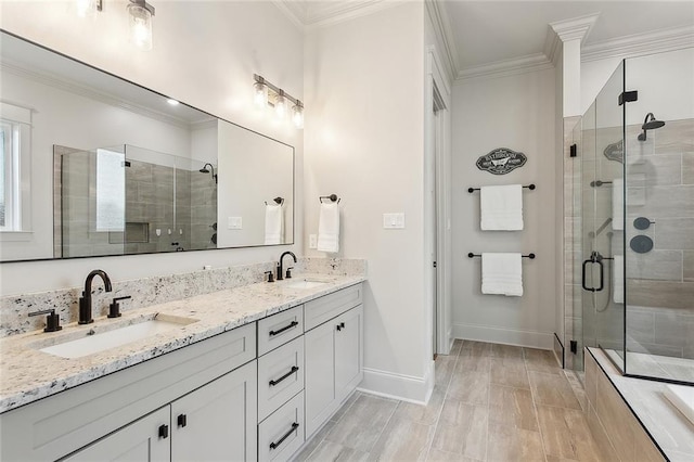 bathroom with walk in shower, ornamental molding, and vanity