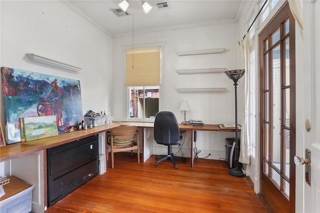 office space with crown molding and hardwood / wood-style floors