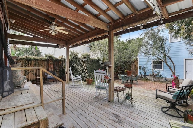 wooden deck with ceiling fan