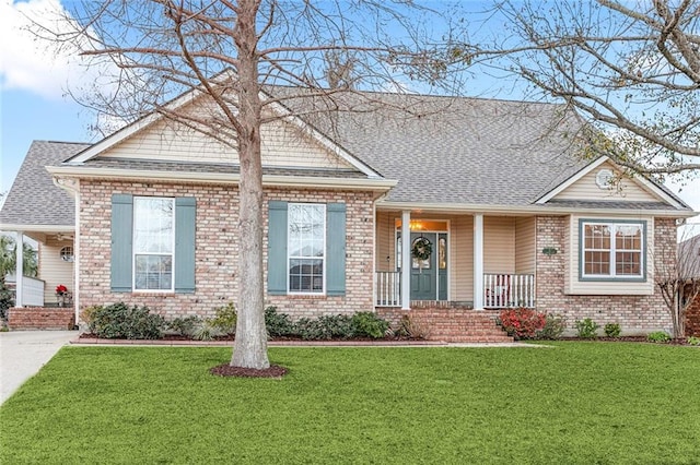 view of front of home featuring a porch and a front yard