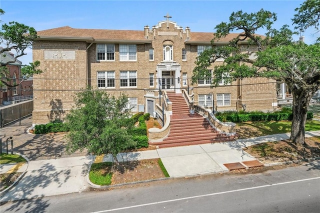 view of building exterior with stairway