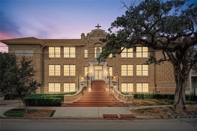 view of property at dusk