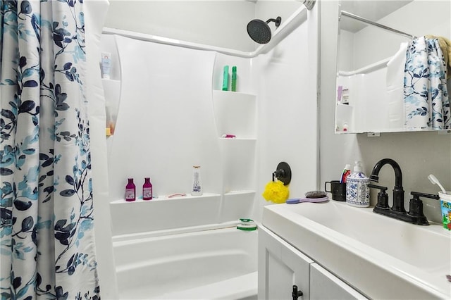 bathroom featuring vanity and shower / bath combo with shower curtain