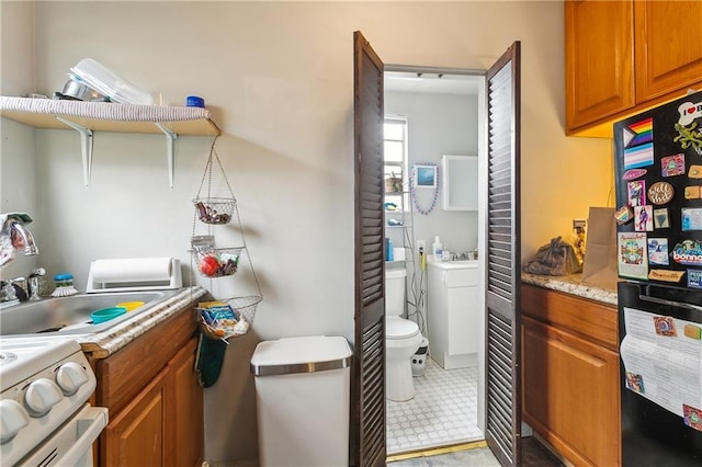 bathroom with sink and toilet