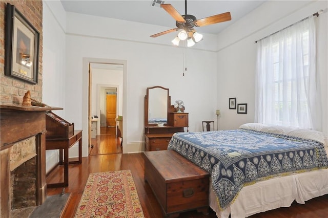 bedroom with hardwood / wood-style floors and ceiling fan