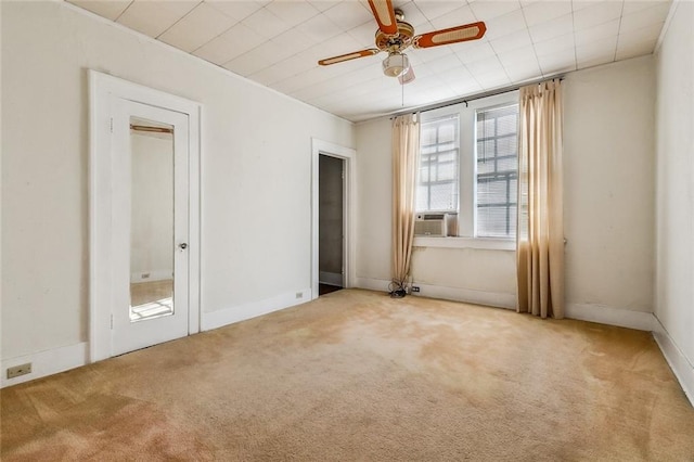 unfurnished bedroom featuring carpet floors and ceiling fan