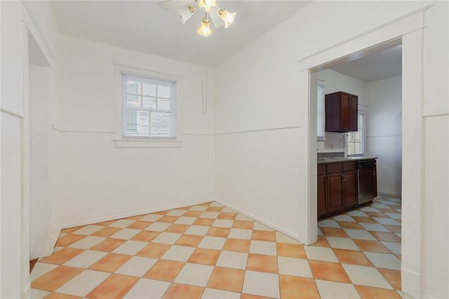 unfurnished room with ceiling fan