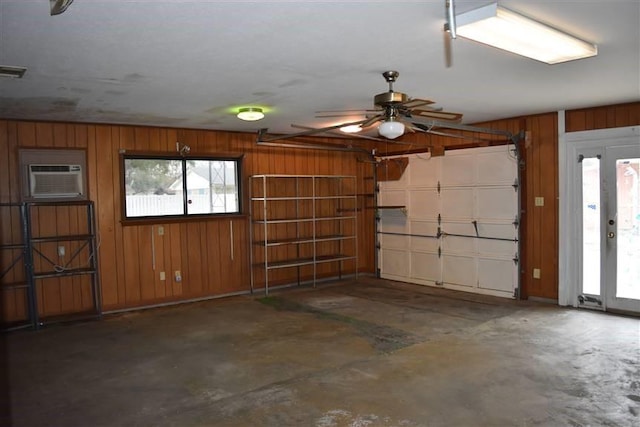 1668 2nd St, Lutcher, LA 70071 - garage with wooden walls and a wall mounted AC