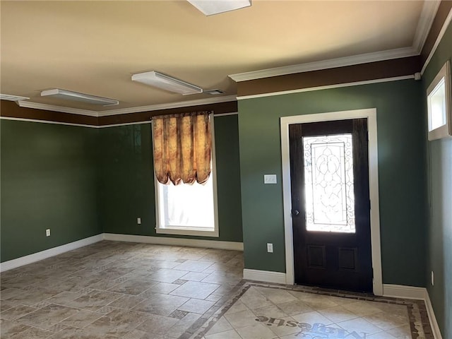 foyer entrance featuring crown molding
