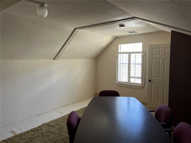 interior space featuring lofted ceiling