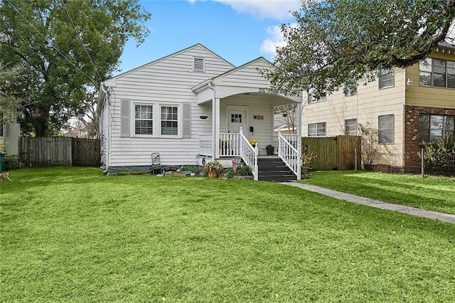 view of front of house with a front lawn