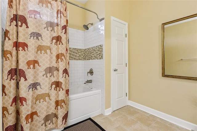 bathroom featuring tile patterned floors and shower / bath combo with shower curtain