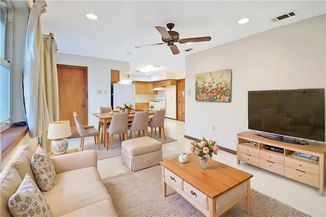 living room with ceiling fan